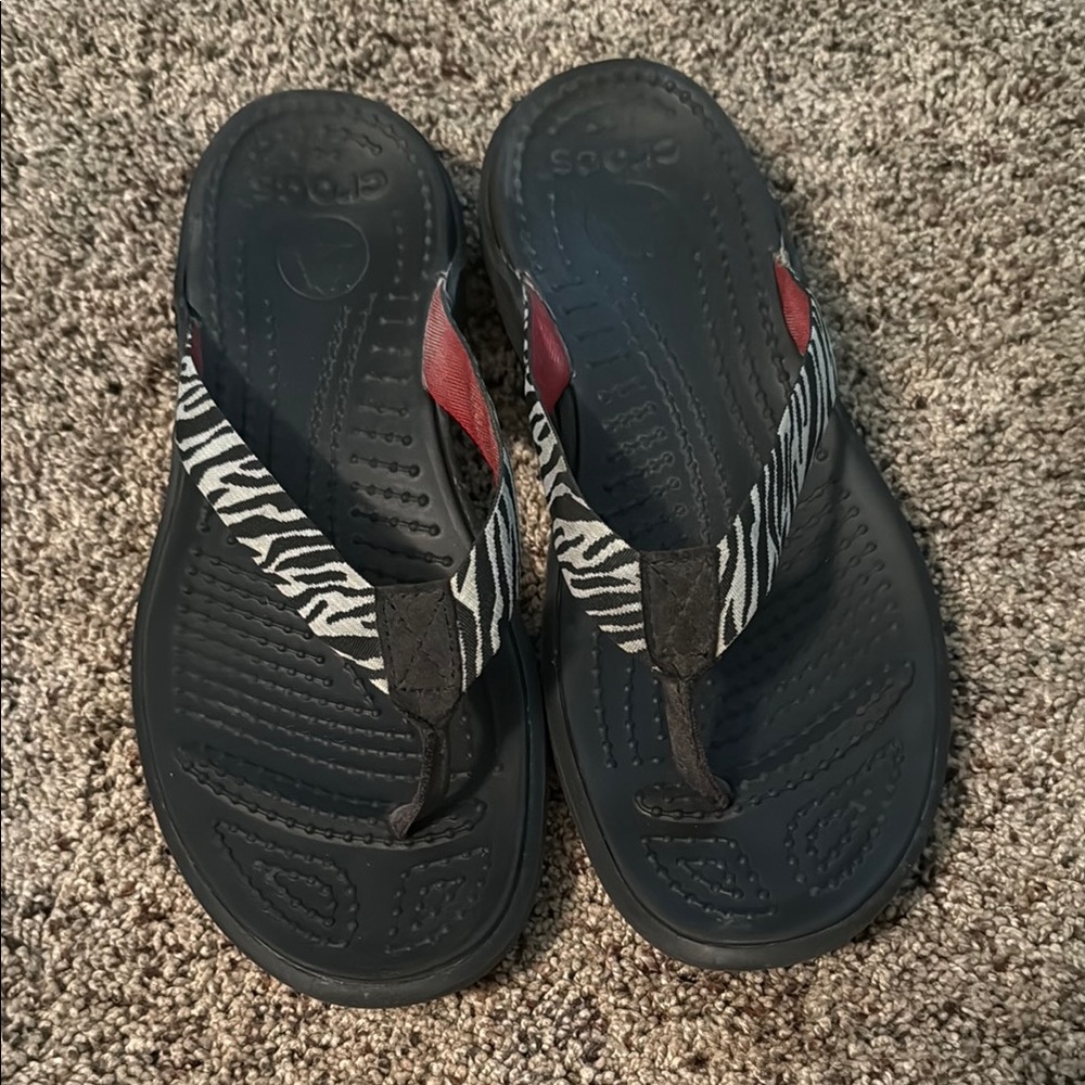 CROCS Black and White Zebra Flip Flops Like New
